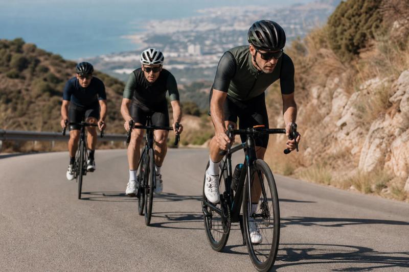 A small group of road riders pacing a steady climb near Marbella